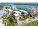 Luxury waterfront home with private dock and lush landscaping at 815 Tropical Cir, Sarasota, FL 34242