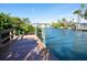 Wooden dock extending over the water at 815 Tropical Cir, Sarasota, FL 34242
