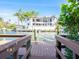 Private dock with steps leading to the water at 815 Tropical Cir, Sarasota, FL 34242