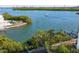 Calm waterway view with lush vegetation at 815 Tropical Cir, Sarasota, FL 34242