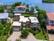 Waterfront property with private dock and lush landscaping at 815 Tropical Cir, Sarasota, FL 34242
