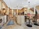 Gourmet kitchen boasts granite countertops, custom cabinetry, and a large island at 815 Tropical Cir, Sarasota, FL 34242