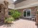 Peaceful courtyard with brick paving and small plants at 815 Tropical Cir, Sarasota, FL 34242
