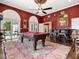 Game room with pool table and access to backyard patio at 815 Tropical Cir, Sarasota, FL 34242
