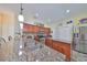 Beautiful kitchen featuring granite countertops, stainless steel appliances, and custom cabinetry at 17706 Bridlewood Ct, Parrish, FL 34219