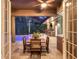 Outdoor patio with table and chairs, overlooking pool at 17706 Bridlewood Ct, Parrish, FL 34219