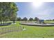 Community playground with swings, slides, and climbing structures, perfect for Gathering fun at 17706 Bridlewood Ct, Parrish, FL 34219