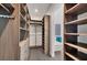 Spacious closet with custom shelving and built-in storage, providing ample space for organization at 2234 Hibiscus St, Sarasota, FL 34239