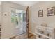 Welcoming entryway with a view to a private balcony at 7673 Fairway Woods Dr # 706, Sarasota, FL 34238