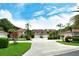 Charming community of homes with lush landscaping and red tile roofs, perfect for peaceful living at 7673 Fairway Woods Dr # 706, Sarasota, FL 34238
