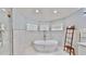 Relaxing bathroom with a freestanding tub and glass shower at 815 Hickory Glen Dr, Seffner, FL 33584