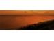 Breathtaking sunset over ocean, highlighting property's prime beachfront location at 2945 Pyrula Dr, Longboat Key, FL 34228