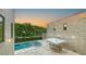 Elevated view of resort-style pool, spa, and patio area at 2945 Pyrula Dr, Longboat Key, FL 34228