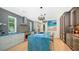 Modern kitchen with blue marble countertops and stainless steel appliances at 2945 Pyrula Dr, Longboat Key, FL 34228