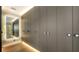Large walk-in closet with floor to ceiling cabinetry at 2945 Pyrula Dr, Longboat Key, FL 34228
