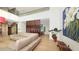 Light-filled living area with sectional sofa, high ceilings, and hardwood floors at 2945 Pyrula Dr, Longboat Key, FL 34228