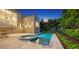 Backyard oasis featuring a modern pool and spa, creating a relaxing atmosphere at 2945 Pyrula Dr, Longboat Key, FL 34228