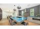 Gourmet kitchen boasting a large island with blue marble countertop at 2945 Pyrula Dr, Longboat Key, FL 34228