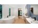 Elegant bathroom with freestanding tub and walk-in shower at 2945 Pyrula Dr, Longboat Key, FL 34228