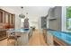 Modern kitchen with a breakfast bar and stainless steel appliances at 2945 Pyrula Dr, Longboat Key, FL 34228