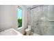 Contemporary bathroom with floating vanity and large shower at 2945 Pyrula Dr, Longboat Key, FL 34228