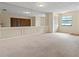 Bright living room with mirrored wall and neutral carpeting at 4109 66Th Street W Cir # 4109, Bradenton, FL 34209