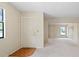 Bright entryway with wood flooring and view into living room at 4109 66Th Street W Cir # 4109, Bradenton, FL 34209