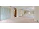Bedroom with large closet and view into adjacent living area at 4109 66Th Street W Cir # 4109, Bradenton, FL 34209