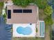 Overhead view of community pool, solar panels, and shuffleboard at 4109 66Th Street W Cir # 4109, Bradenton, FL 34209