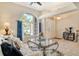 Living room with a view to the backyard, featuring a sofa and coffee table at 815 128Th Ne St, Bradenton, FL 34212