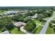 Bird's-eye view of house in a residential community near a lake at 815 128Th Ne St, Bradenton, FL 34212