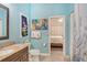 Charming bathroom with a toilet, sink, and shower, plus a bedroom view at 815 128Th Ne St, Bradenton, FL 34212