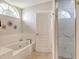 Elegant bathroom with soaking tub, walk-in shower, and updated fixtures at 815 128Th Ne St, Bradenton, FL 34212