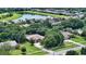 Bird's-eye view of house in a residential community near a lake at 815 128Th Ne St, Bradenton, FL 34212