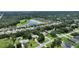 Bird's-eye view of house in a residential community near a lake at 815 128Th Ne St, Bradenton, FL 34212