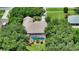 Single-Gathering home with pool, surrounded by trees at 815 128Th Ne St, Bradenton, FL 34212
