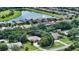 Bird's-eye view of house in a residential community near a lake at 815 128Th Ne St, Bradenton, FL 34212