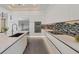 Sleek kitchen with stainless steel appliances and contemporary backsplash at 2234 Hibiscus St, Sarasota, FL 34239