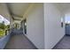 Side view of contemporary balcony with gray tile floor at 2234 Hibiscus St, Sarasota, FL 34239