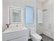 Modern bathroom with a walk-in shower and floating vanity at 2234 Hibiscus St, Sarasota, FL 34239