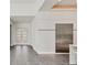 Modern home entry with grey tile floors and white doors at 2234 Hibiscus St, Sarasota, FL 34239