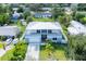 Aerial view of a two-story house with metal roof and a two-car garage at 2234 Hibiscus St, Sarasota, FL 34239