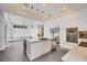 Modern kitchen featuring a large island, stainless steel appliances, and white cabinetry at 2234 Hibiscus St, Sarasota, FL 34239