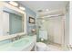 Updated bathroom with glass shower and modern vanity at 184 Pineneedle Dr # 184, Bradenton, FL 34210