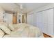 Main bedroom with hardwood floors and ample closet space at 184 Pineneedle Dr # 184, Bradenton, FL 34210