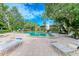 Refreshing community pool with ample lounge chairs at 184 Pineneedle Dr # 184, Bradenton, FL 34210