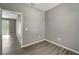 Simple office space with neutral walls and wood-look floors at 1174 S Mcduff St, North Port, FL 34288