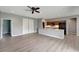 Open concept kitchen with granite countertops and wood cabinets at 1174 S Mcduff St, North Port, FL 34288