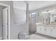 Elegant Primary bathroom with dual vanities, large shower, and plenty of counter space at 17723 Polo Trl, Bradenton, FL 34211