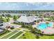 Aerial view of community with pool, clubhouse, and homes at 17723 Polo Trl, Bradenton, FL 34211